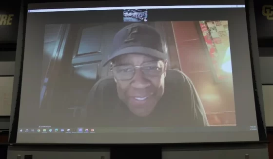 Actor Denzel Washington speaks with members of the University of Colorado football team in March 2025. | YouTube/ Well Off Media